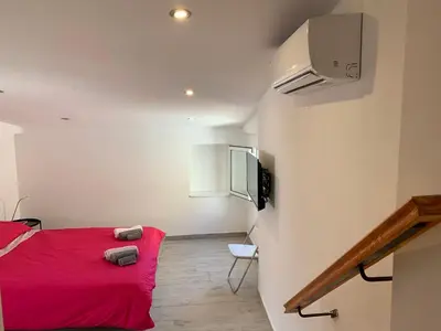 Letto o letti in una camera di Deni's apartments per 4
