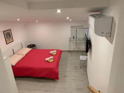 Letto o letti in una camera di Deni's apartments per 4