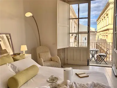 Letto o letti in una camera di Maestranza72 by Bed&Bros