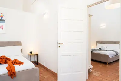 Letto o letti in una camera di Maestranza72 by Bed&Bros