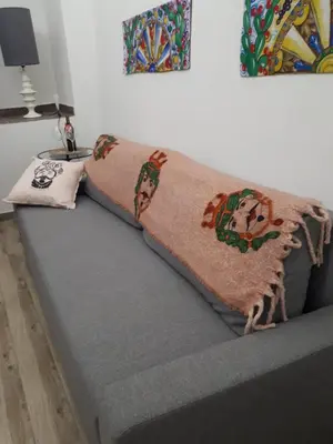 Letto o letti in una camera di MAMARICO' APARTAMENT