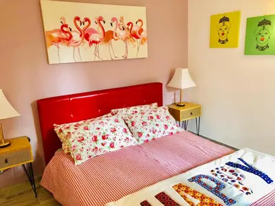 Letto o letti in una camera di MAMARICO' APARTAMENT