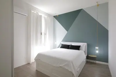 Letto o letti in una camera di Green House - 1 Min dal Mare-Vicinissimo ad Ortigia e al Teatro-parcheggio fuori ZTL in strada gratuito