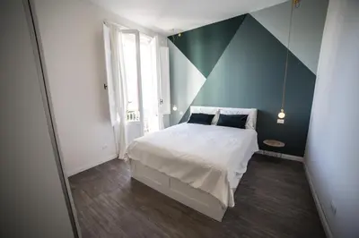 Letto o letti in una camera di Green House - 1 Min dal Mare-Vicinissimo ad Ortigia e al Teatro-parcheggio fuori ZTL in strada gratuito