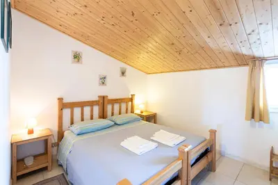 Letto o letti in una camera di Giogaia