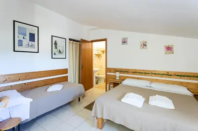 Letto o letti in una camera di Giogaia