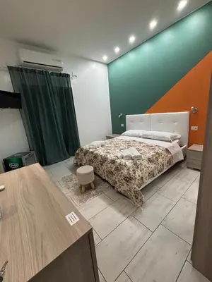 Letto o letti in una camera di Primo Hotel