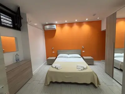 Letto o letti in una camera di Primo Hotel
