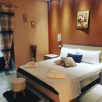 Letto o letti in una camera di Primo Hotel