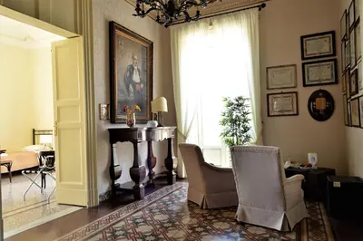 Area soggiorno di Al Teatro Massimo Suites