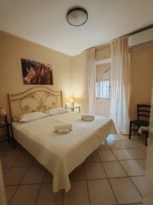 Letto o letti in una camera di Life Hotels Residence dei Baroni