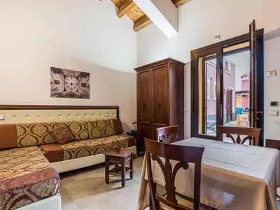 Area soggiorno di Holiday Home near Mount Etna Views