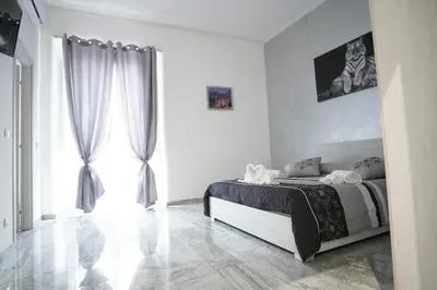 Letto o letti in una camera di Central Catania Apartment