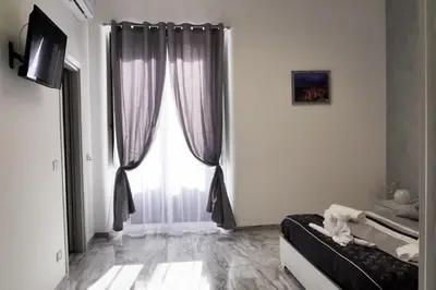 TV o dispositivi per l'intrattenimento presso Central Catania Apartment