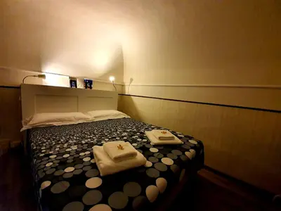 Letto o letti in una camera di Lina's House