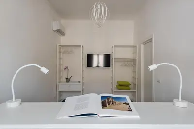 Letto o letti in una camera di D-Home Ortigia