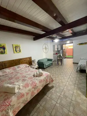 Letto o letti in una camera di Villa Joseph