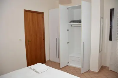 Letto o letti in una camera di Garibaldi Flat