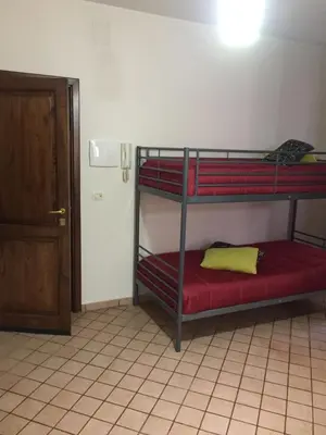 Letto o letti in una camera di Garibaldi Flat