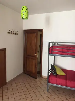 Letto o letti in una camera di Garibaldi Flat