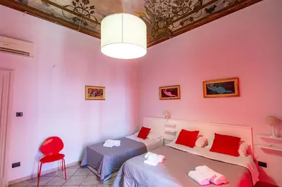 Letto o letti in una camera di Promenade B&B