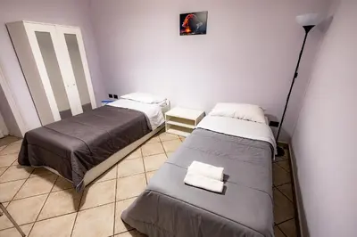 Letto o letti in una camera di Promenade B&B
