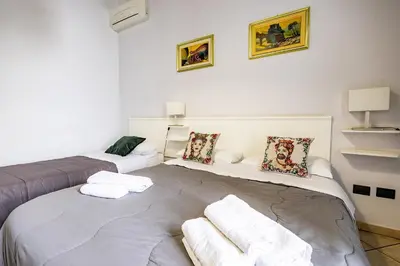Letto o letti in una camera di Promenade B&B