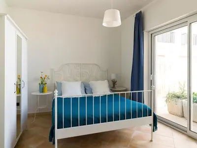 Letto o letti in una camera di Harbor Houses