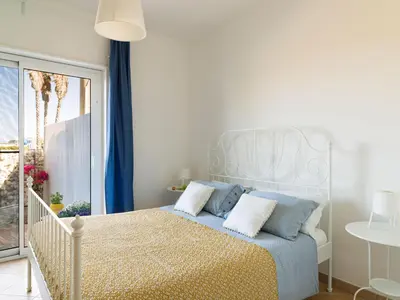 Letto o letti in una camera di Harbor Houses