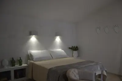 Letto o letti in una camera di CORALLI DEL PLEMMIRIO