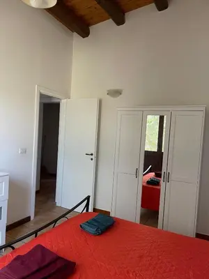 Letto o letti in una camera di Punta del Cane