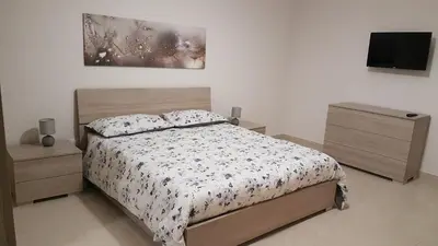 Letto o letti in una camera di A casa di Pamy