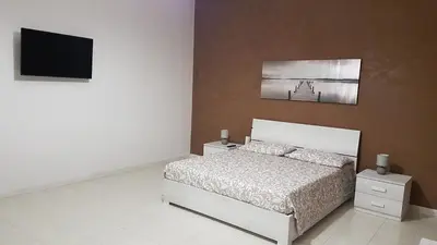 Letto o letti in una camera di A casa di Pamy