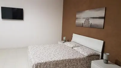 Letto o letti in una camera di A casa di Pamy