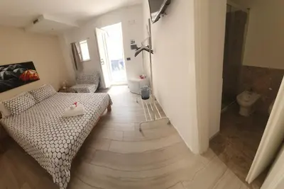 Letto o letti in una camera di il daviduccio house