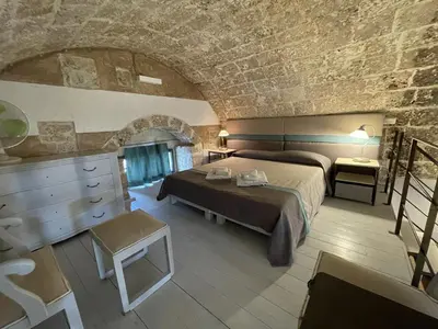 Letto o letti in una camera di Il Dammuso di Noto - Villa con Piscina privata