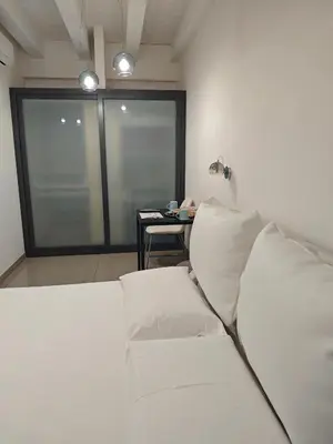 Letto o letti in una camera di Paolino Exclusive Rooms