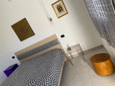 Letto o letti in una camera di B&B Terra Marique