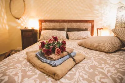 Letto o letti in una camera di Domus Astra