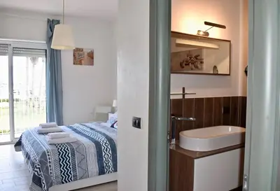 Letto o letti in una camera di Harbor Houses II