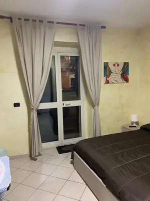 Letto o letti in una camera di Airport Bedroom House