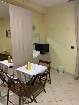 TV o dispositivi per l'intrattenimento presso Airport Bedroom House