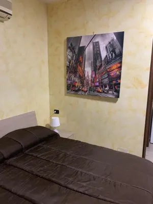 Letto o letti in una camera di Airport Bedroom House