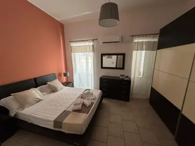 Letto o letti in una camera di Ortigia spartan house 2