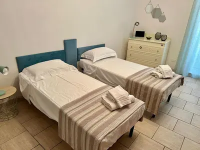 Letto o letti in una camera di Ortigia spartan house 2