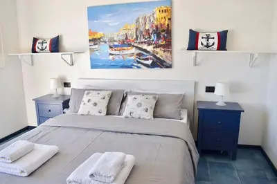 Letto o letti in una camera di Harbor Houses III