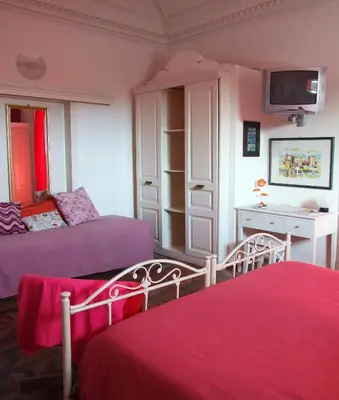 Letto o letti in una camera di B&B Bianca