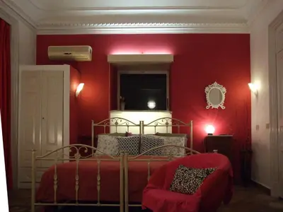 Letto o letti in una camera di B&B Bianca