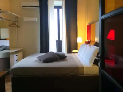 Letto o letti in una camera di B&B Bianca