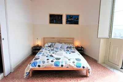 Letto o letti in una camera di DiVino Mare rooms